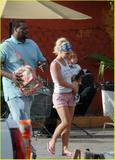 Britney Spears in her latest braless candids; in white top, pink shorts and bandana
