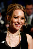http://img184.imagevenue.com/loc1140/th_42383_Hilary_Duff_at_the_New_York_Stock_Exchange_after_ringing_the_opening_bell-20_122_1140lo.jpg